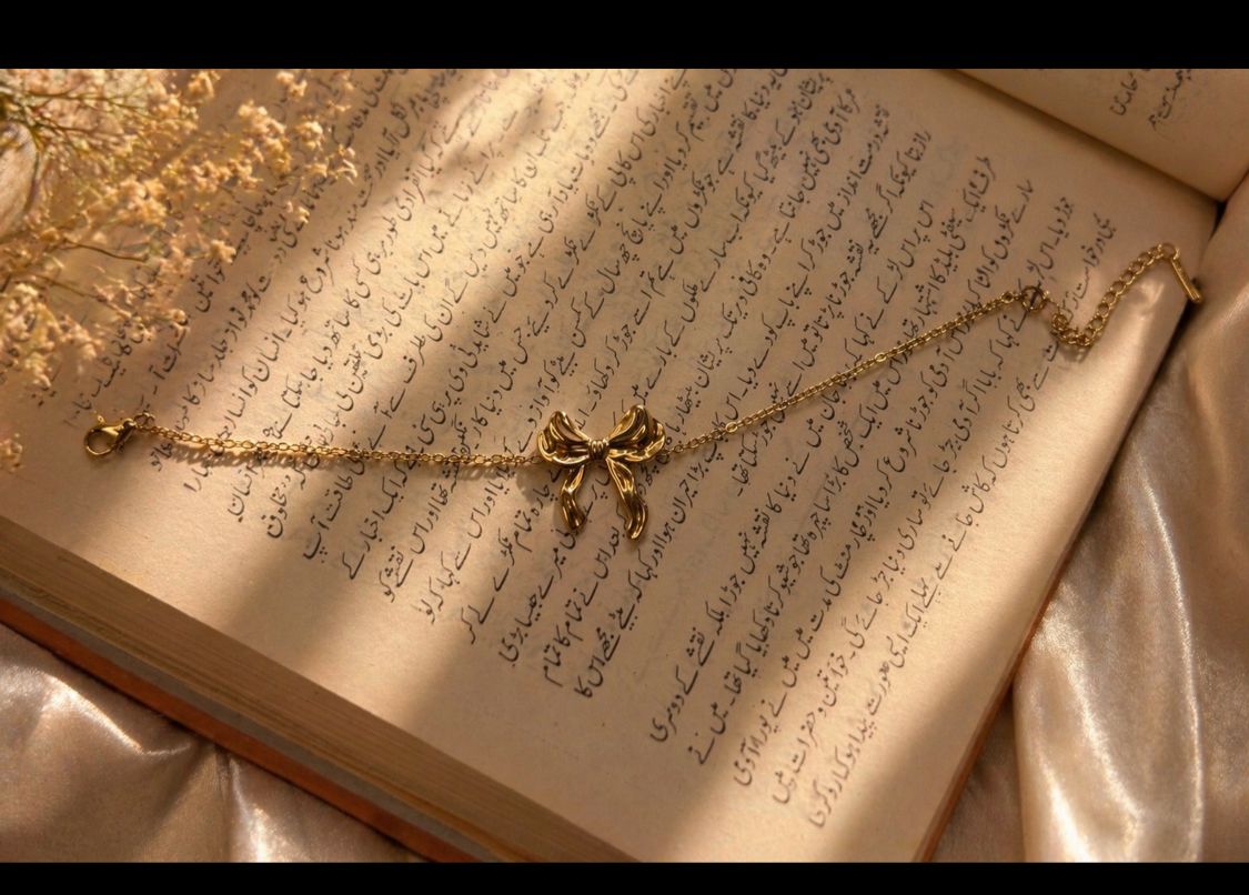 Golden Bow Charm Bracelet